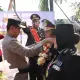 Dengan Pedang Pora, Kapolres Pelabuhan Makassar Lepas Personelnya yang Purna Bhakti